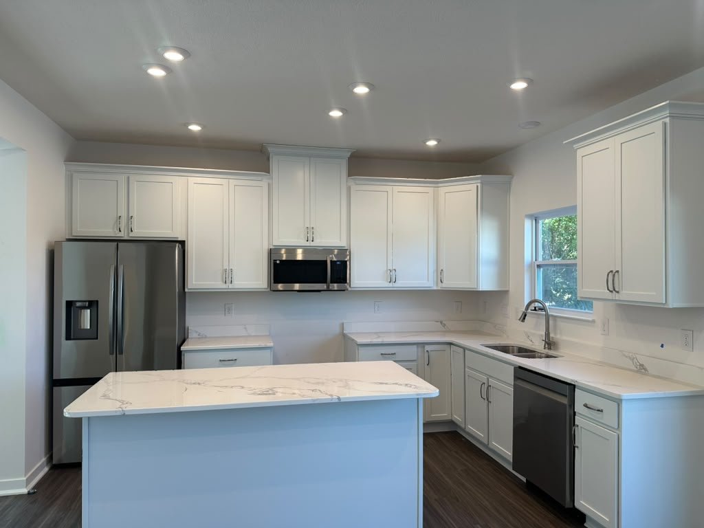 Kitchen and bathroom remodeling work by RJ Painting and Remodeling Services